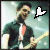 A 50x50 pixel animated buddy icon showing a person playing guitar with two frames of heart animation, displayed in a contact sheet layout.