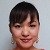 Static pixelated portrait of a person with short dark hair, light skin, and a neutral expression against a light gray background.