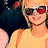 A person in a yellow shirt with red sunglasses and a peace sign gesture appears alongside a black-and-white peace symbol icon.