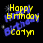 Yellow pixelated text reads 'Happy Birthday Corrym' over a black background with blue and gray pixelated splatter effects.