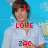 Pixelated image of a person with brown hair wearing a light blue shirt against a bright blue background, overlaid with red text reading "I LOVE ZAC".