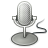 Pixelated grayscale microphone icon with circular base and coiled cord on light gray background.