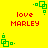 Yellow background with red text 'love MARLEY' and green pixelated square patterns in four corners.