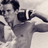 A pixelated grayscale image of a person in motion with text overlay reading "this is my bf".
