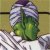 Pixelated image of a green figure with purple hair and white accents, set against a yellowish background with a checkered foreground pattern.