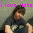 Pixelated image of a person with dark hair wearing a dark shirt, with pink text reading 'i love Nate' overlaid at the top against a gray background.
