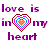 Pixelated text 'love is in my heart' surrounds a multicolored pixel-art heart with concentric rings of red, pink, blue, and orange on white background.