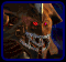 Animated sequence of a brown armored creature with red eyes and silver teeth, showing head movements against dark blue background.