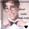 Pixelated image of a person in a white shirt and black bow tie adjusting the tie with both hands, with text reading 'your just jealous' and a black heart symbol.