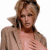 A split-frame contact sheet showing a pixelated image of a person on the left and green text on a dark background on the right, both in low-resolution 50x50 AIM icon style.