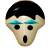 Pixelated face with black hair, turquoise eyebrows, black eyes, and a black mouth on a light beige background.