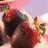 Animated sequence showing a couple kissing, chocolate candies in a box, and a Hershey's Kiss candy with blue text.