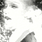 A black-and-white animated sequence showing a person with styled hair and makeup in various facial expressions, including open mouth, closed lips, and squinted eyes.