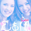 Two smiling women with long brown hair appear in a blue-tinted static image with stylized white text and pink stars.