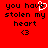 Red background with black pixelated text reading "you have stolen my heart" and a small heart symbol, featuring an animated white heart shape over the word "have".
