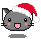 Pixelated gray cat head with red and white Santa hat, pink cheeks, black eyes, and open mouth showing pink tongue.