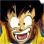 Pixelated cartoon character with spiky brown hair, wide white eyes, and a broad open-mouthed grin showing teeth, set against a dark background with yellow and orange accents.