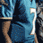 Pixelated contact sheet of a football player in blue uniform with Reebok logo and name text on light blue background.