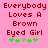 Pink background with red pixelated text reading 'Everybody Loves A Brown Eyed Girl' and green clover symbols below.