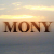 Pixelated image of the word 'MONY' in brown letters against a gradient background transitioning from light yellow to blue.