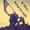 Silhouetted soldiers raising a U.S. flag on a hilltop, with text reading 'Keep us safe if they' against a yellowish sky.