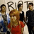 A static image shows a group of people with 'RIP T' text behind them, surrounded by green text names on a blue background.