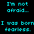 Cyan pixelated text on black background repeats 'I'm not afraid...' and 'I was born fearless.' in a pattern
