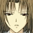 Pixelated anime-style character face with brown hair and neutral expression on left, adjacent to black background with white text "Anime IM" above smaller cursive "com" on right.