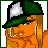 Pixelated cartoon character with orange skin, green cap, and green shorts, transitioning from a side profile to a full-body view with visible text elements.