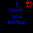 Pixelated blue text reads "I Love you Rachel" with a red heart symbol replacing the word "Love" on black background.