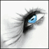 A close-up of a blue eye with long black eyelashes, showing subtle animation changes