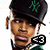Pixelated image of a person wearing a black cap with green NY logo, white earbuds, and a green shirt, with green text reading "Tell me how to breathe with..." and "No Air" on dark backgrounds.