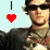 A 50x50 pixel animated buddy icon featuring a person in sunglasses with repeated frames showing text and symbols on the left side, including a red heart and 'BAM' logo.