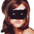 Pixelated image of a person with long brown hair wearing a black mask covering eyes and nose, light skin tone, static composition on white background.