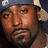 A pixelated contact sheet showing two frames of an animated buddy icon with a person wearing a blue cap and white earflap on the left, and "G-unit South" text in white block letters on a black background on the right.