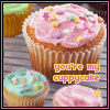 A cupcake-themed image with pink-frosted cupcakes and text reading 'you're my cuppycake' on a wooden background.