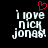 Pixelated text 'i love NICK JONAS!' in white with a red heart symbol above the first frame, transitioning to a static version without the heart.