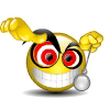 Yellow emoji face with red eyes, black eyebrows, and a wide grin holding a silver ball-and-chain in its right hand.