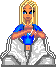 Pixelated character with blonde hair, blue eyes, and a blue top holding a white object against gray background.