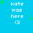 Blue background with white text 'kate was here <3' repeated in a , green star shapes scattered across the image