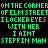 Green pixelated text on black background with partial gray rectangle in bottom-right corner, displaying song lyrics and phrases.
