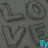 Gray background with large dark gray 'LOVE' text, small cyan and purple pixel clusters near bottom-right.