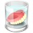 A pixelated glass containing a red and yellow fruit slice, likely watermelon, with visible seed details.