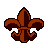 Pixelated fleur-de-lis symbol in brown and dark brown tones on a light gray background, rendered in a low-resolution 16x16 grid with distinct pixel blocks.