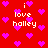 Red background with scattered pink hearts and repeated white text reading 'i love halley' in pixelated font.
