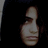 Pixelated image of a person with dark hair against black background, text 'Hooder' and 'coming soon' in white block letters.