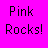 A static image with a solid bright pink background displaying pixelated black text reading "Pink Rocks!" in two lines.