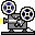 Two pixel-art film projectors on gray background, each with two reels showing blue and black patterns; yellow light beams emit from lenses.
