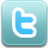 Pixelated blue 't' symbol on rounded square teal background with white outline.