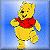 Static pixelated image of a yellow cartoon bear wearing a red shirt against a blue background, with visible dithering and blocky rendering artifacts.